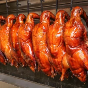 Delicious Beijing Roast Duck Crispy Skin and Flavorful Traditional Chinese Cuisine Honey Glazed and Ready to Eat